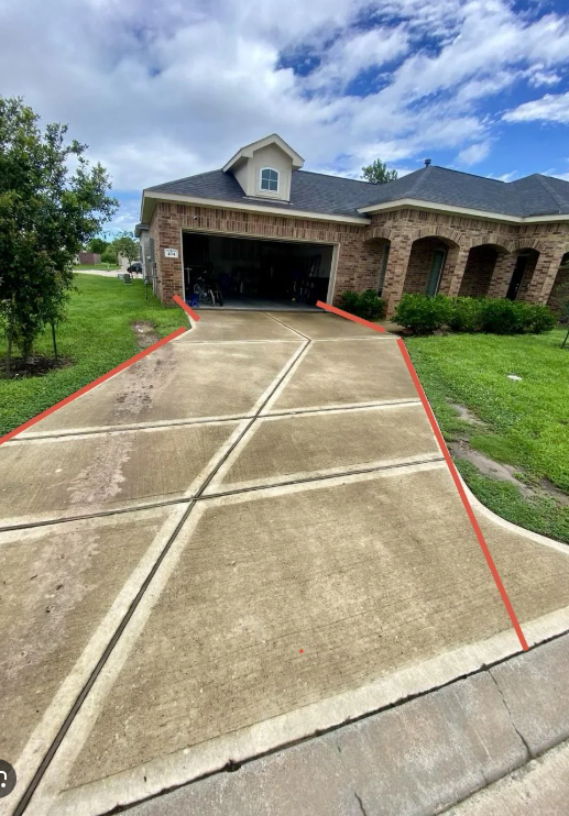 Amanda's photo of her driveway, worn grass along the left edge